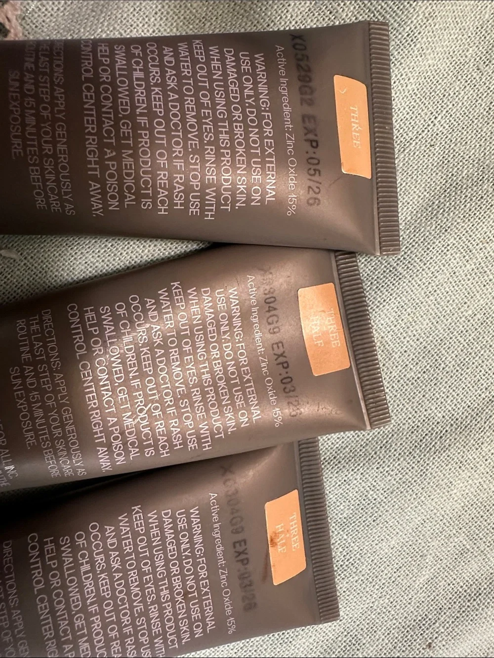 Saie Slip Tint Tinted Moisturizer Trio - Taupe & Rose Gold Accents